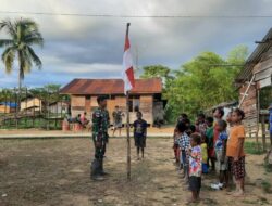 Anak Papua Pedalaman Bergembira Bersama Satgas Yonif 143/TWEJ dan Merah Putih