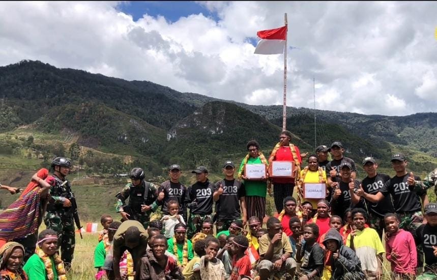 Yonif Mekanis 203/AK Ajak Masyarakat Malagayneri Hidup Sehat Lewat Lomba Voli