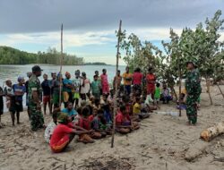 Babinsa Posramil Potowaiburu Himbaunya Siswa Kembali ke Sekolah