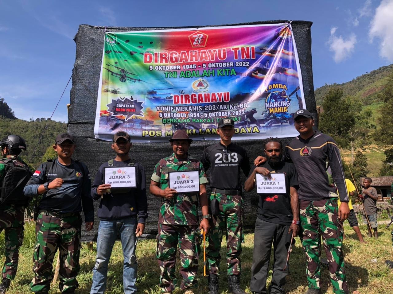 Perayaan HUT TNI ke-77 dan Yonif Mekanis 203/AK ke-68 dengan Lomba Mancing di Papua
