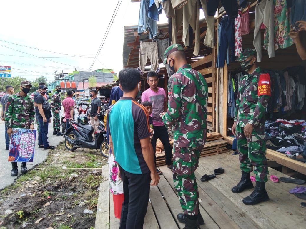 Prajurit TNI Yonif 642 Terapkan Prokes dan Kampanye Cegah Covid-19