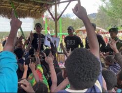 Ceria Anak Distrik Malagay Bersama Satgas Yonif Mekanis 203 AK