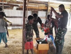 Keceriaan Warga Pirima Menyambut Natal Bersama Satgas Yonif Mekanis 203 AK