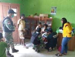 Yonif 126/KC Bantu Imunisasi Balita di Wilayah Perbatasan