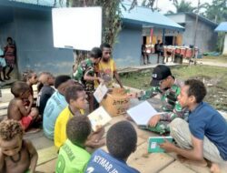 Satgas Yonif 143/TWEJ Bangun Sekolah Darurat untuk Anak Papua di Pedalaman