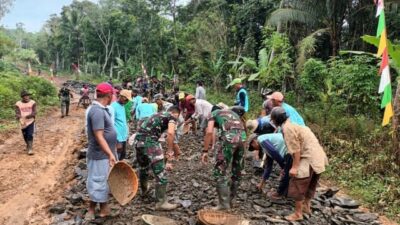 Satgas TMMD 113 Kodim 0601/Pdg Tetap Bekerja Meskipun Hujan