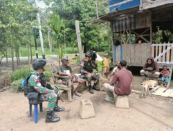 Semangat HUT RI Ke-77, Satgas Yonif 126/KC Bagikan Baju Merah Putih