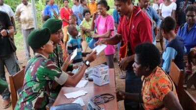 Satgas Yonif 411 Kostrad dan IDI Adakan Bakti Sosial di Perbatasan RI-PNG