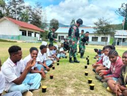 Yonif Raider 142 KJ Gencarkan Minum Susu untuk Siswa Papua