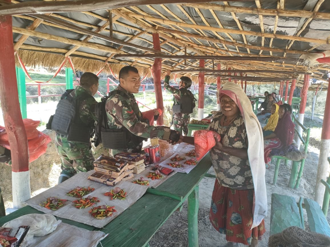 Peran Yonif Mekanis 203/AK dalam Mendorong Ekonomi Masyarakat Papua