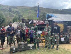 Sambut Bulan Kasih, Satgas Yonif 203/AK Sosialisasi Sikat Gigi dan Voli