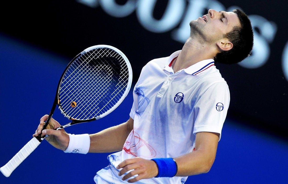 Novak Djokovic menjual bola tenis Australia untuk $540.000 pada pertandingan terbuka 2012